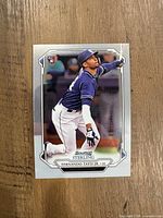 Front of 2019 Bowman Sterling Fernando Tatis Jr. rookie card showing action photograph and Bowman Sterling branding