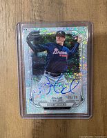 Front of Kolby Allard Bowman Sterling speckle refractor autograph card showing autograph and serial number 75/99