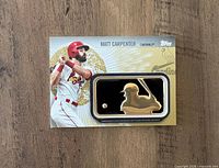 Front of Matt Carpenter patch card showing player image and gold silhouette patch