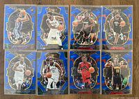 Fronts of all eight Blue Prizm cards lined in two rows