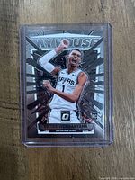 Front of Victor Wembanyama My House rookie card in sleeve and top loader