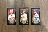 Fronts of three black mini refractor cards showing Burnes, Harper, Sandberg