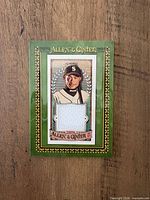 Front view showing Ichiro portrait, green frame, relic swatch, Allen & Ginter 2024 branding