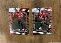 Front view of Xavier Worthy and Bucky Irving 2024 Panini Absolute rookie cards