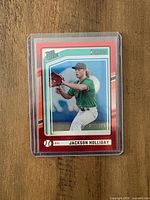 Front of card showing Jackson Holliday Rated Prospect Red parallel in sleeve