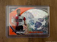Front of 2024 Topps Chrome Robin Van Persie Starball Debut card showing serial number 14/25 and holographic design