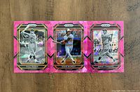 Front view of all three Pink Ice refractor cards