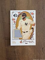 Front of Aaron Judge relic card showing player image and fabric swatch