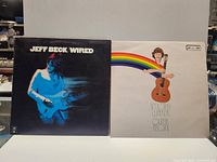 Front jackets of both LPs