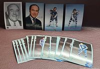 Front view of all cards showing four large postcards and small fan cards