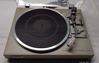 Top view of Pioneer PL-514 turntable with platter, tonearm, and dust cover