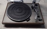 Top view of PROJECT/one DR-330 turntable showing platter, tonearm and controls