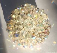 Front view showing bead cluster and aurora borealis finish