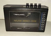 Front view showing logo, cassette window and frequency scale