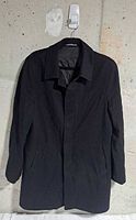 Front view of black wool topcoat on hanger