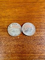 Both quarters reverse bobcat side