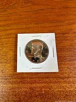 Obverse of 2000 Kennedy half dollar in 2x2 flip