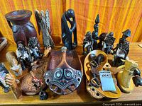 overview of all carved wooden items on table
