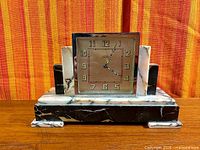 Front view of Smiths marble mantel clock