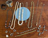 Overview of all jewellery pieces laid out on table