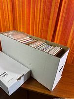 Full long box of bagged comics
