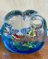 Front view of Murano aquarium sculpture showcasing two fish, seaweed and blue base