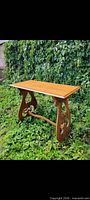full view of handmade trestle table front angle