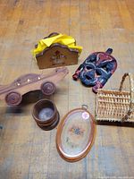 lot overview showing all wooden items and basket