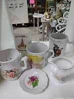 Group shot of all seven porcelain pieces