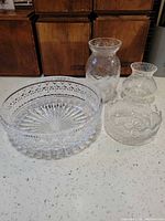 Group shot of all four clear cut crystal pieces