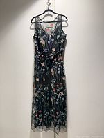 Full front view of the dress on hanger