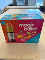 Front of sealed Magic Bullet blender box