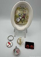 Front view showing all six items including dish and jewelry