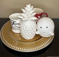 All five items grouped on charger plate