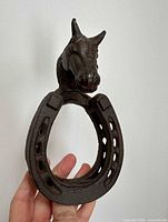 Front view showing horse head and horseshoe shape
