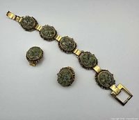 Bracelet and earrings laid flat showing overall design and clasp