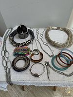 All jewelry pieces laid out on table for overview