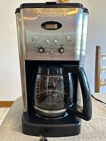 Front view of Cuisinart DCC-1200 coffee maker with carafe