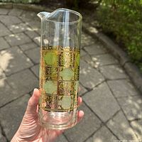 Full view of Culver glass pitcher showing green and gold band