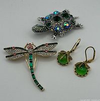 Dragonfly and turtle brooches with pair of green cabochon earrings