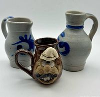 Front view of all three pieces showing designs, colours and shapes.