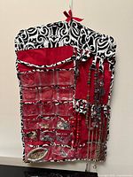 Full view of organizer with pockets and hanging jewelry
