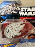 Front of sealed Hot Wheels Star Wars Millennium Falcon blister pack