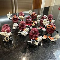 Group shot of all ten California Raisins figurines