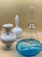 Group shot of Lenox vase, porcelain bell, crystal bell, blue art glass bowl