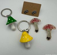 All five mushroom-themed accessories displayed