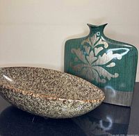 Vase and bowl together for scale and comparison