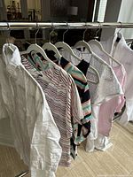 Full rack showing all seven garments