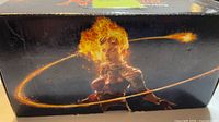 Exterior of Magic: The Gathering branded card storage box with Chandra illustration