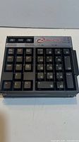 Closed view of folded Zboard keyboard showing numeric keypad section and logo